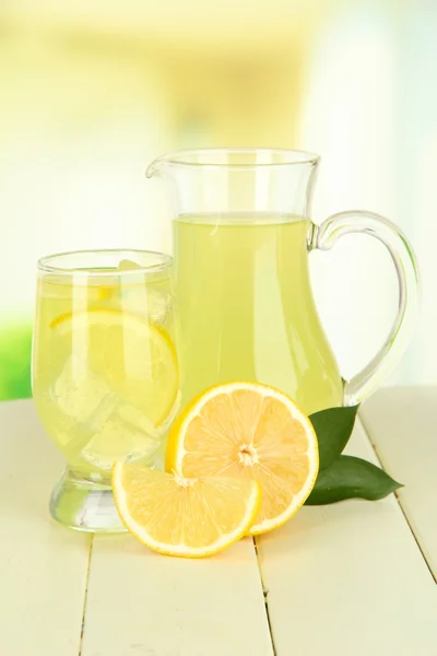 Delicious lemonade on table on light background — Stock Photo, Image