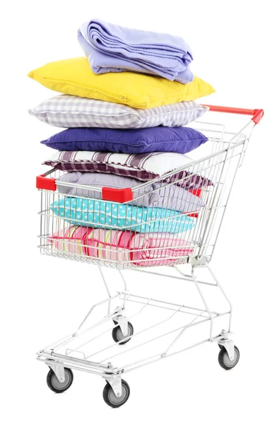 Shopping cart with pillows, isolated on white — Stock Photo, Image