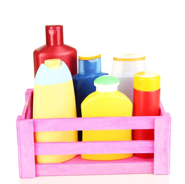 Caixa de madeira com produtos cosméticos isolados em branco — Fotografia de Stock