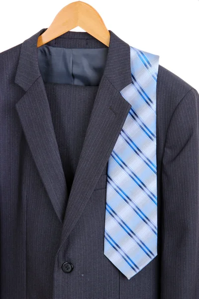 Traje y corbata en percha sobre fondo blanco —  Fotos de Stock