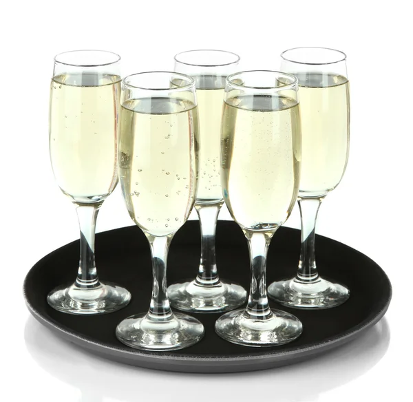 Muitos copos de champanhe na bandeja, isolados em branco — Fotografia de Stock