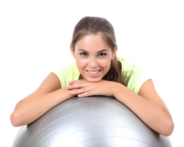 年轻的美丽健身女孩与灰色球上白色孤立 — 图库照片