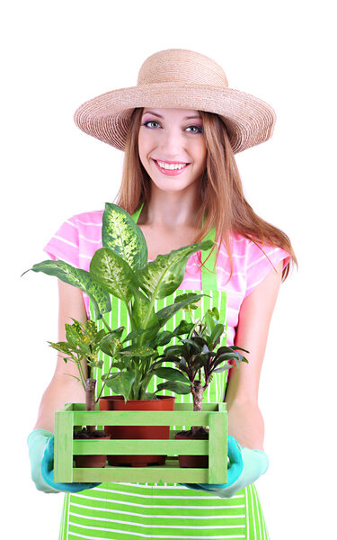 Beautiful girl gardener with flowers isolated on white