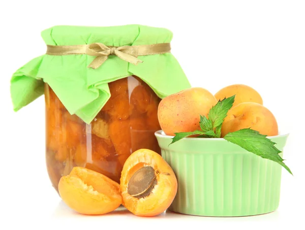 Apricot jam in glass jar and fresh apricots, isolated on white — Stock Photo, Image