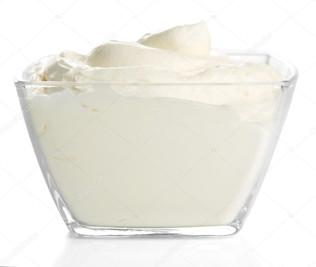 Sour cream in bowl isolated on white