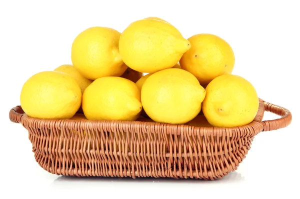 Ripe lemons in wicker basket isolated on white — Stock Photo, Image