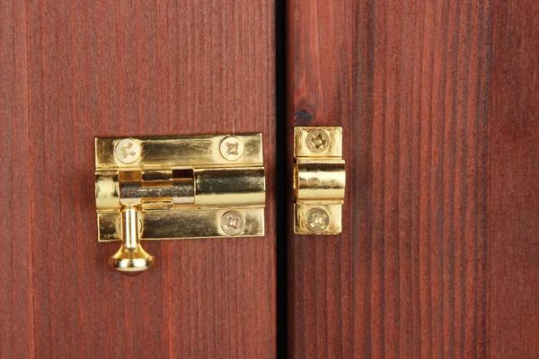 Metal latch in wooden door close-up — Stock Photo, Image