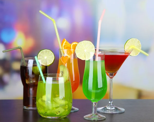 Set of different drinks on bright background — Stock Photo, Image