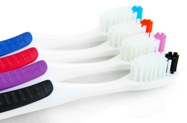 Зубні щітки ізольовані на білому — стокове фото