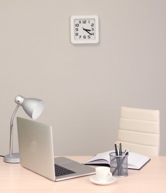 Office workplace with computer, close up clipart