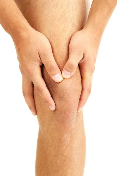 Młody człowiek z bólem kolana, na białym tle — Zdjęcie stockowe