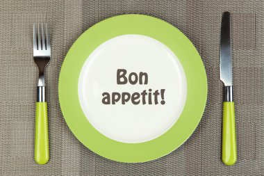 bıçak, renk tabak ve çatal, renkli arka plan üzerinde