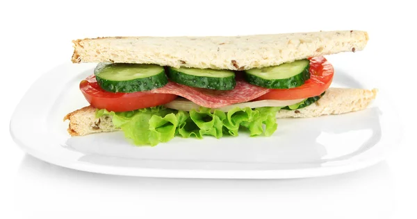 Tasty sandwich with salami sausage and vegetables on white plate, isolated on white — Stock Photo, Image