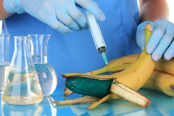 Scientists make injection into banana in laboratory — Stock Photo, Image