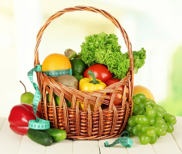 Fresh vegetables on table on light background — Stock Photo, Image