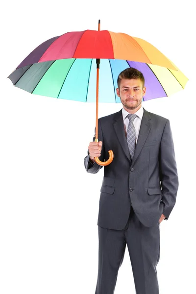 Empresário com guarda-chuva multicolorido, isolado em branco — Fotografia de Stock