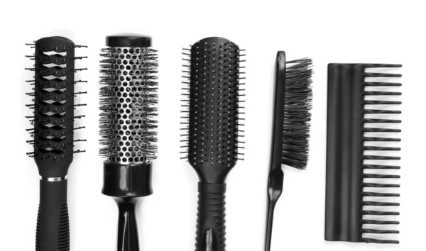 Black combs isolated on white — Stock Photo, Image