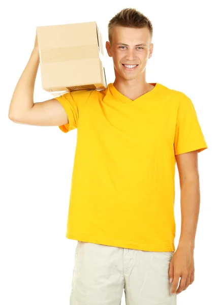 Νεαρού delivery άνθρωπος που κρατά το δέμα, που απομονώνονται σε λευκό — Φωτογραφία Αρχείου