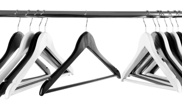 Cabides de roupas preto e branco isolados em branco — Fotografia de Stock
