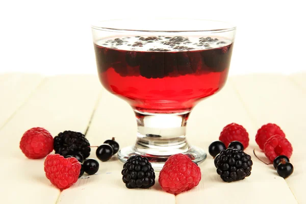 Jelly with fresh berries on wooden table — Stock Photo, Image