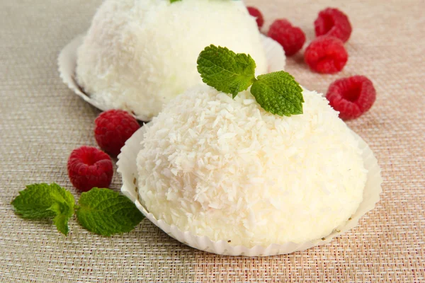 Delicious coconut cakes on table close-up — Stock Photo, Image