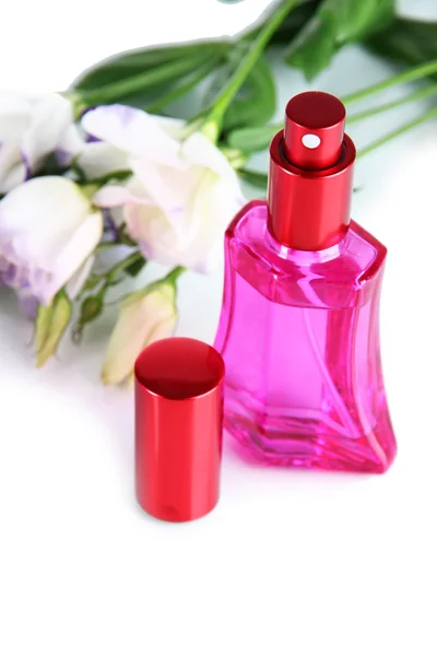 Perfume in bottle and flowers isolated on white — Stock Photo, Image