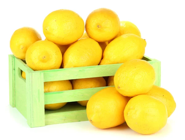 Ripe lemons in wooden box isolated on white — Stock Photo, Image