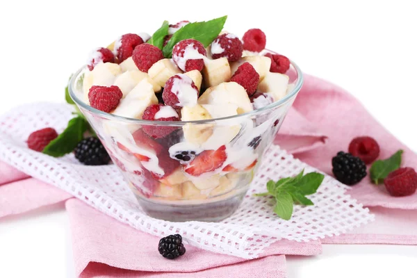 Fruit salad in glass bowl, isolated on white — Stock Photo, Image