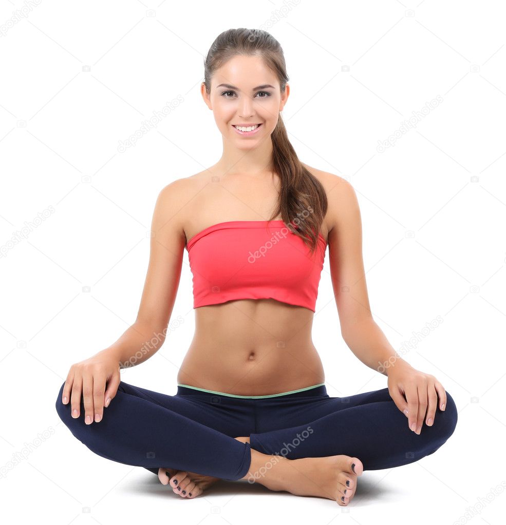 Young beautiful fitness girl doing yoga exercise isolated on white Stock  Photo by ©belchonock 31125441
