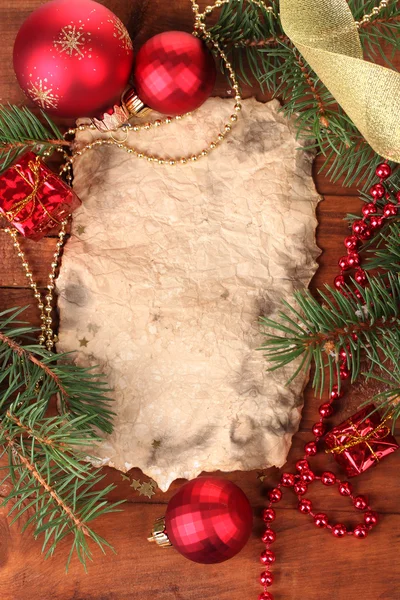 Tarjeta de Navidad sobre mesa de madera —  Fotos de Stock