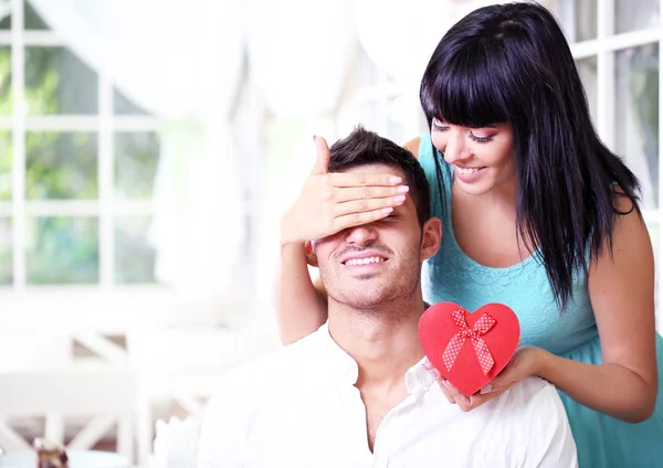 Beautiful young romantic couple in cafe — Stock Photo, Image