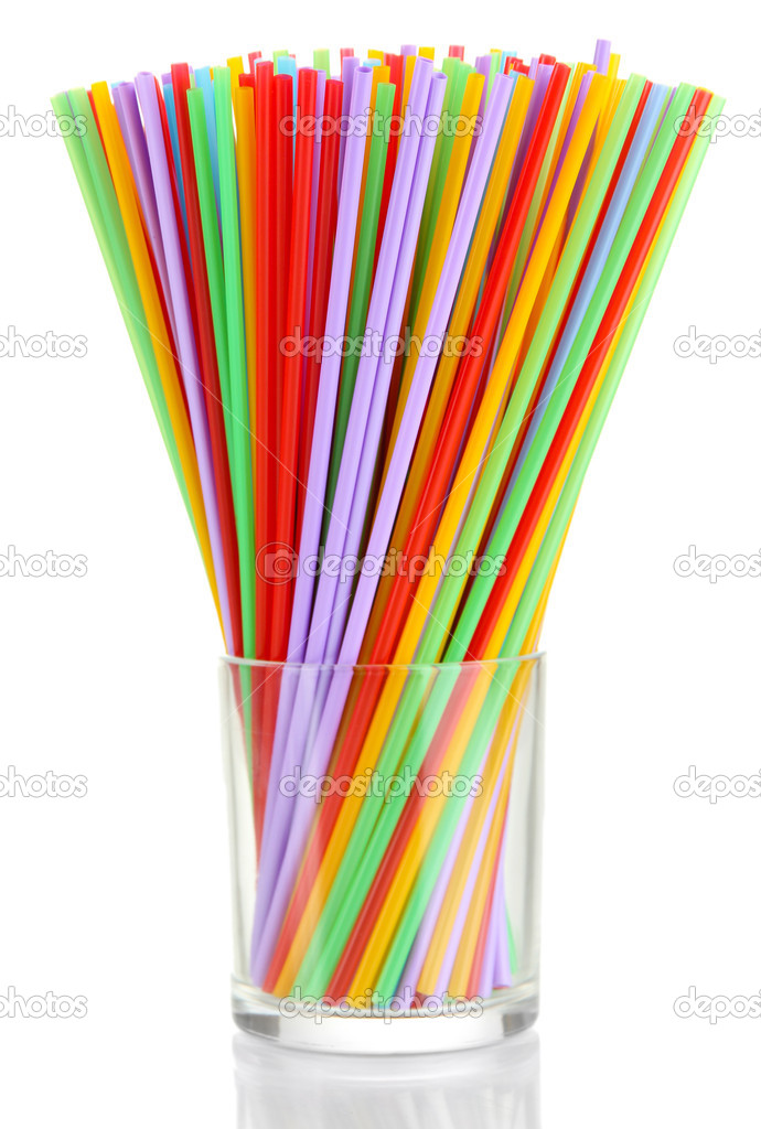 Many straws in glass isolated on white