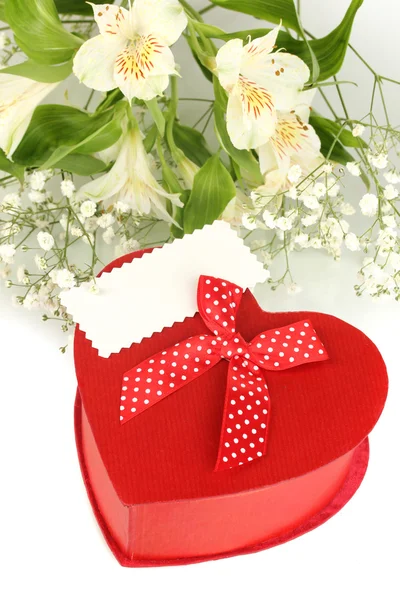 Giftbox and flowers isolated on white — Stock Photo, Image