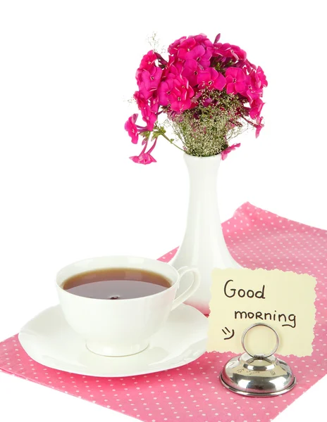 Beautiful bouquet of phlox with cup of tea isolated on white — Stock Photo, Image