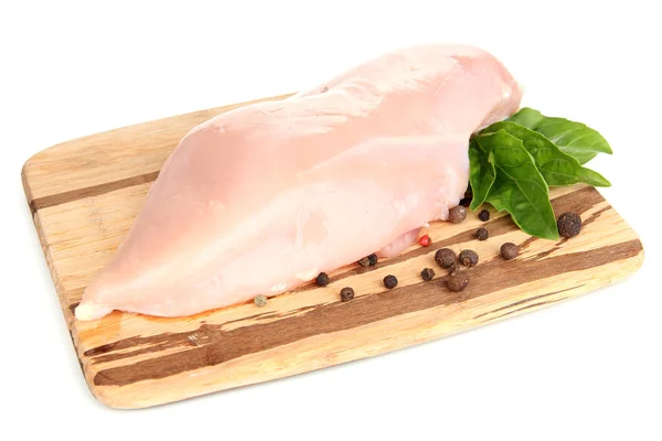 Raw chicken fillets on wooden board, isolated on white — Stock Photo, Image