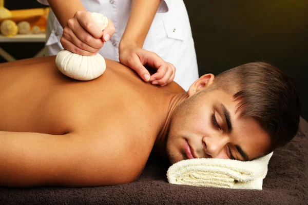 Young man having back massage close up — Stock Photo, Image