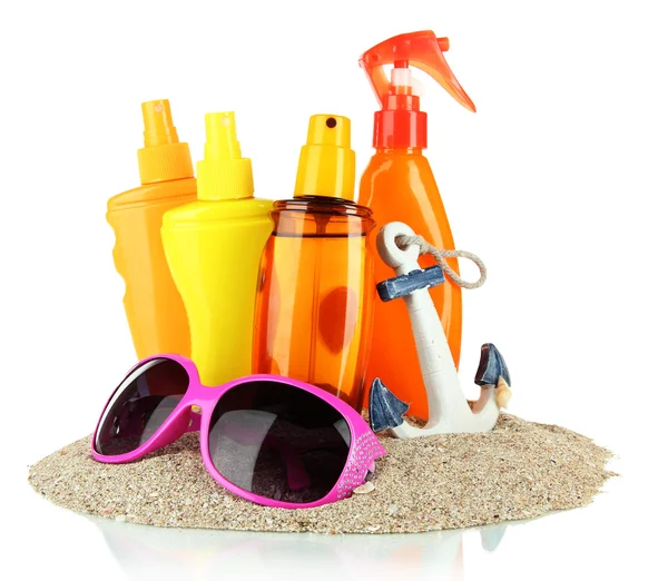 Bottles with suntan cream and sunglasses, isolated on white — Stock Photo, Image