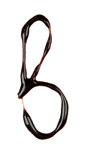 초콜릿 시럽, 흰색 절연에서 만든 알파벳의 소문자 — 스톡 사진