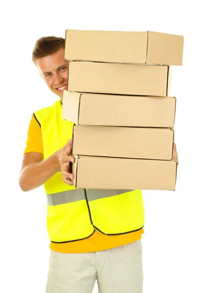 Young delivery man holding parcels, isolated on white — Stock Photo, Image