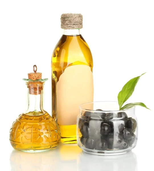 Бутылка с оливковым маслом и маленький графин, изолированный на белом — стоковое фото