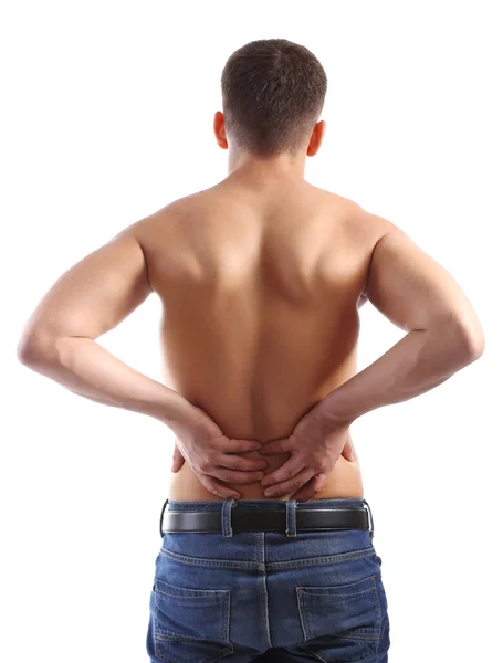 Hombre joven con dolor de espalda, aislado en blanco — Foto de Stock