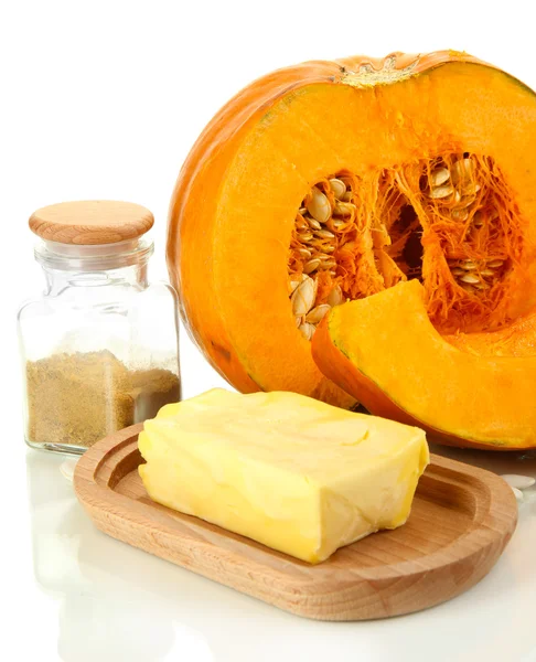 Cut pumpkin with ingredients for cooking isolated on white — Stock Photo, Image
