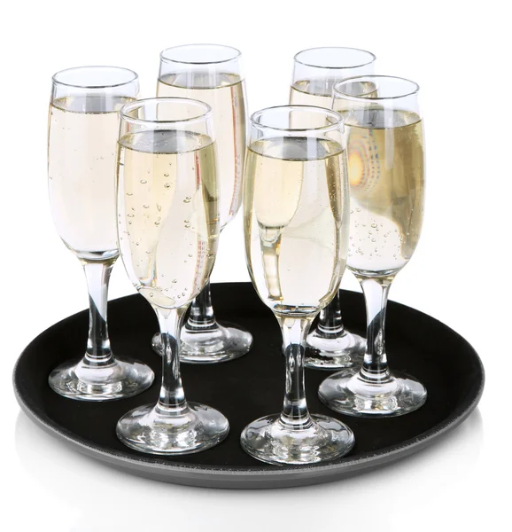 Many glasses of champagne on the tray, isolated on white — Stock Photo, Image