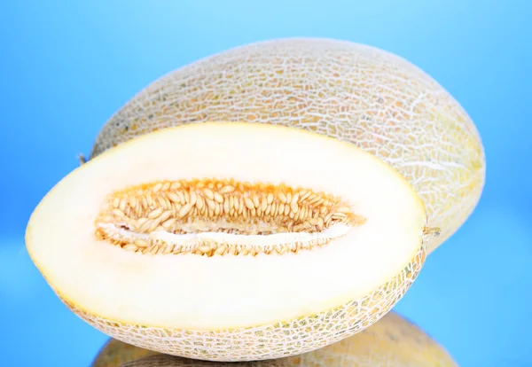 Ripe melons on blue background — Stock Photo, Image