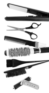 Profesyonel kuaför aletleri, beyaza izole edilmiş.