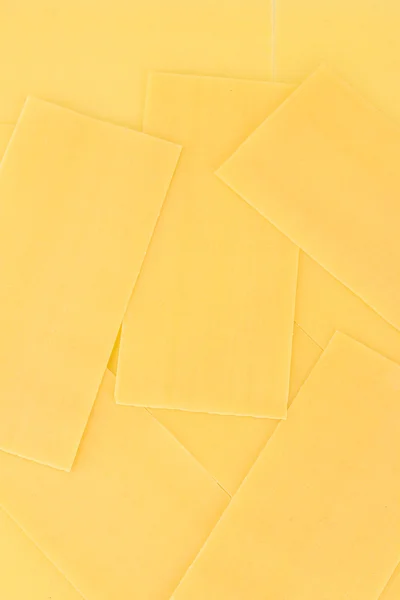 Uncooked lasagna pasta background — Stock Photo, Image