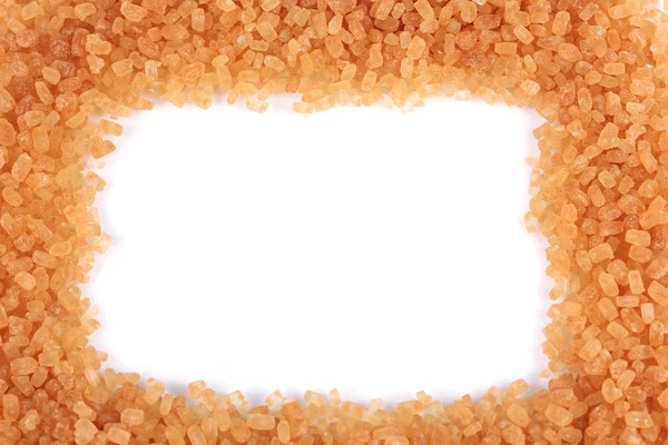 Коричневий цукор на білому тлі — стокове фото
