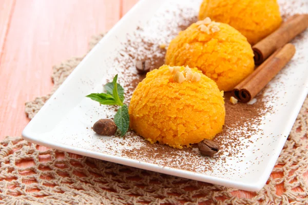 Delicious ice cream on plate on table close-up — Stock Photo, Image