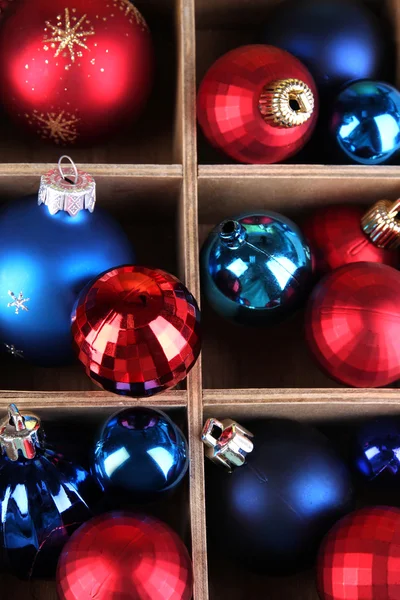 Christmas toys in wooden box close-up background — Stock Photo, Image