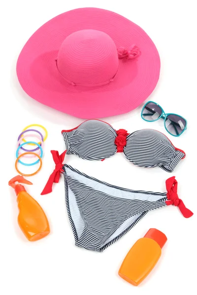 Swimsuit and beach items isolated on white — Stock Photo, Image